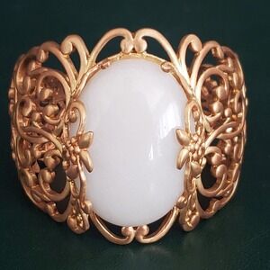 Glow by Sheila Fajl Gold Tone Filigree White Cabochon Cuff Bracelet Statement